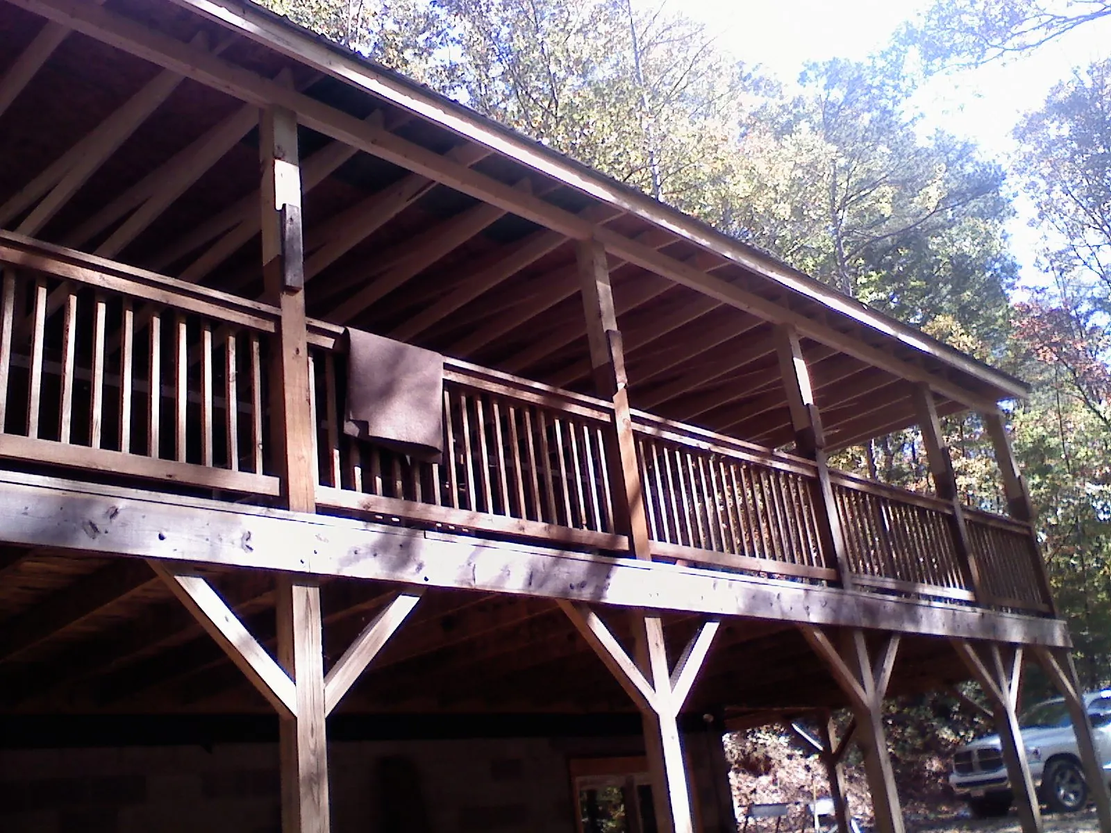 Timber framing under a new elevated porch and deck — Roof Leak Repair in Sequim by Roofing Brothers